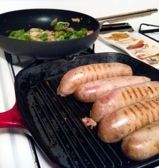 cooking sausage and peppers